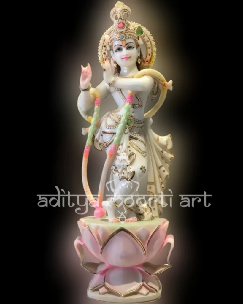 marble Krishna statue on lotus