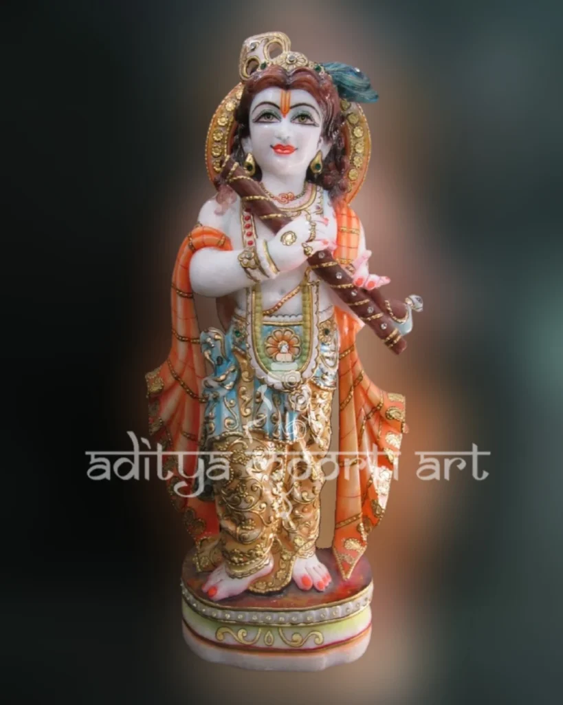 multicolored traditional Krishna marble statue