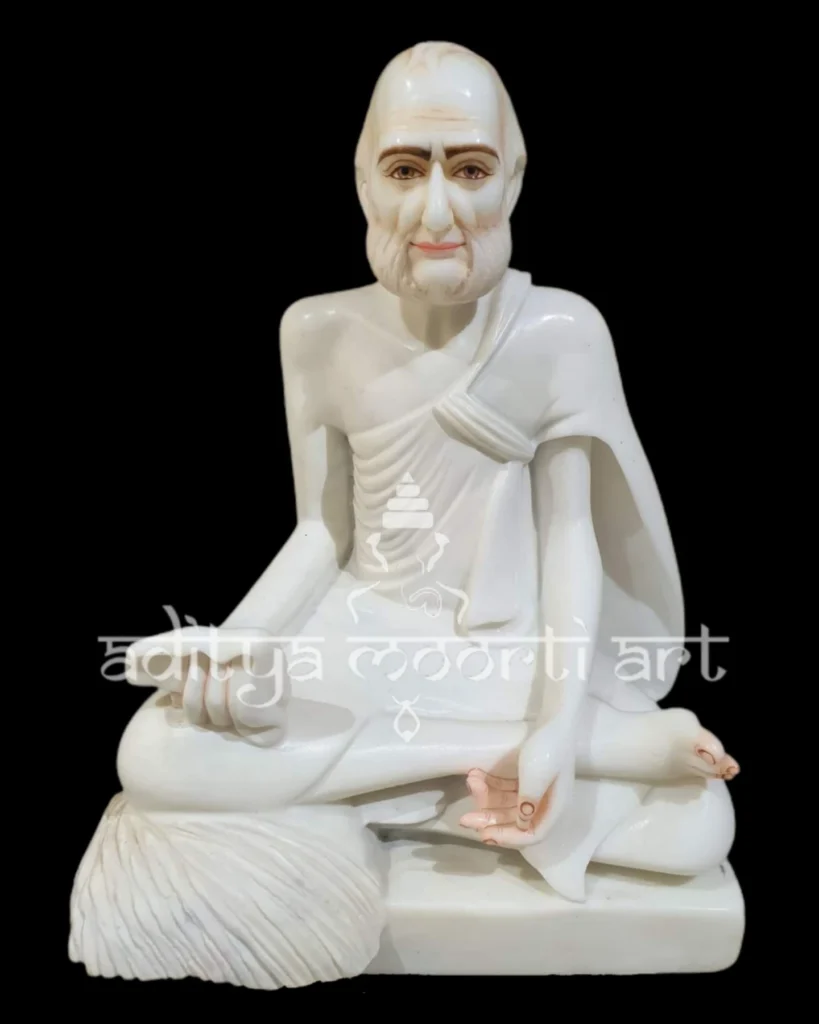 white marble rajendra suri statue
